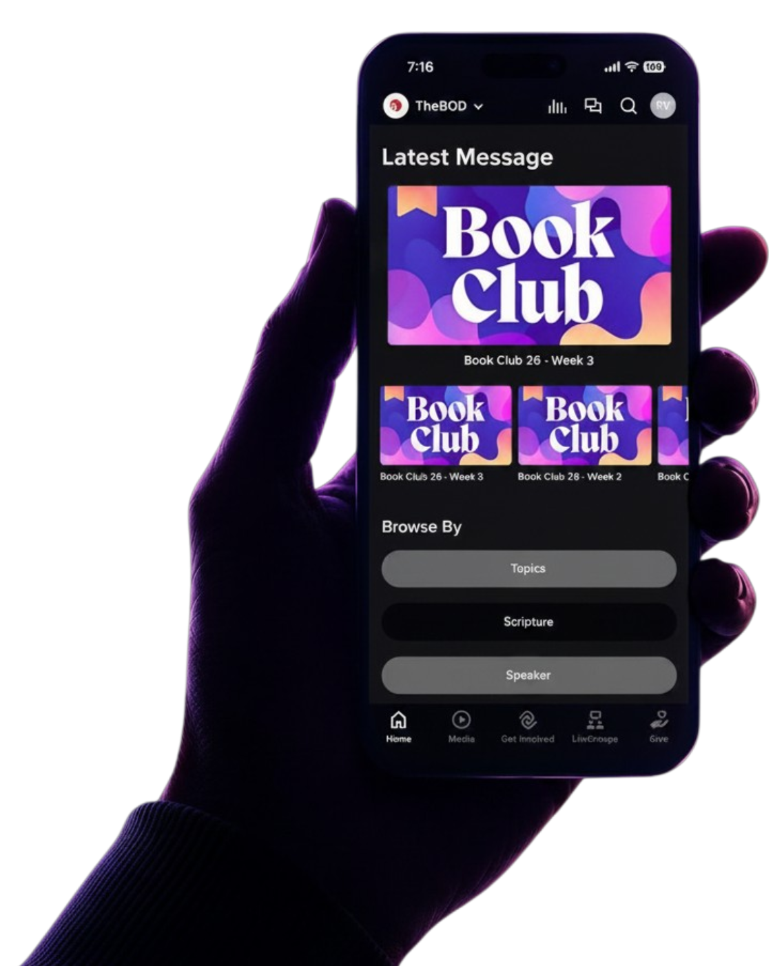 A hand holding a phone showing a custom church app screen